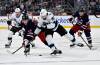 Winnipeg Jets’ Jonathan Toews (19) and Utah Mammoth Kevin Stenlund (82) battle for the puck during the second period of their NHL hockey game in Winnipeg, Sunday, Oct. 26, 2025. THE CANADIAN PRESS/Fred Greenslade