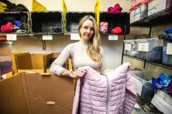 MIKAELA MACKENZIE / FREE PRESS
                                Demand for warm clothes will spike when it snows, says Hillary Gair, senior manager of engagement initiatives at United Way Winnipeg.