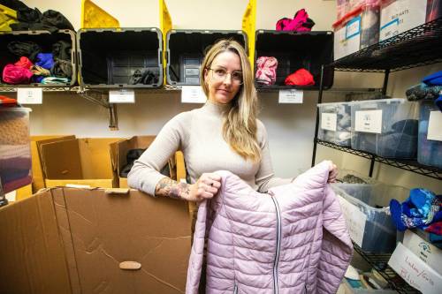 MIKAELA MACKENZIE / FREE PRESS
                                Demand for warm clothes will spike when it snows, says Hillary Gair, senior manager of engagement initiatives at United Way Winnipeg.