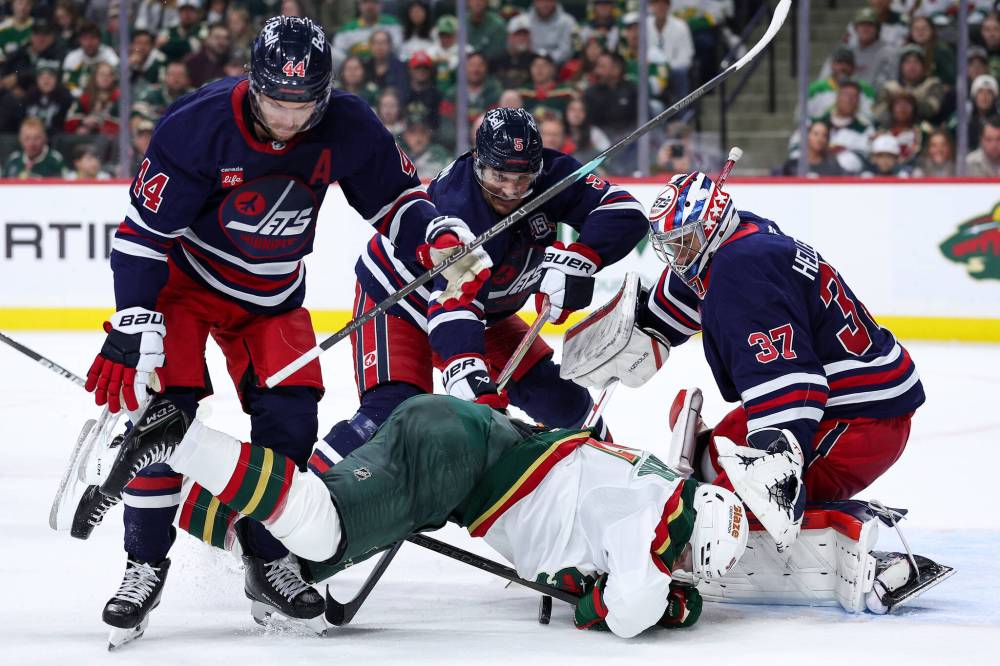 Matt Krohn / The Associated Press
                                 Connor Hellebuyck made 33 saves in the Jets victory.