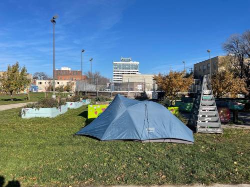 Ruth Bonneville / Free Press
                                Jonah set up a tent next to a community garden and ice rink at the Broadway Community Centre. Tents will soon be banned near playgrounds in Winnipeg.