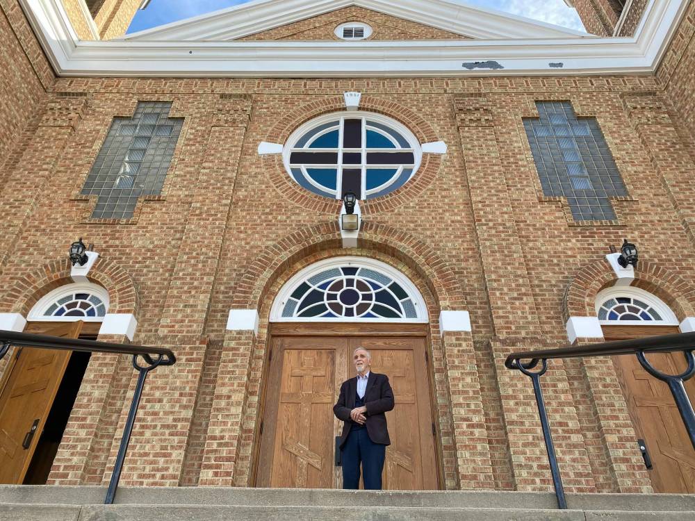 SHELDON BIRNIE / COMMUNITY REVIEW
                                Eugene Hyworon, co-chair of St. Mary the Protectress Ukrainian Orthodox Cathedral’s centennial celebration, says the church was surrounded by ‘wilderness’ when it was on the outskirts past city limits.