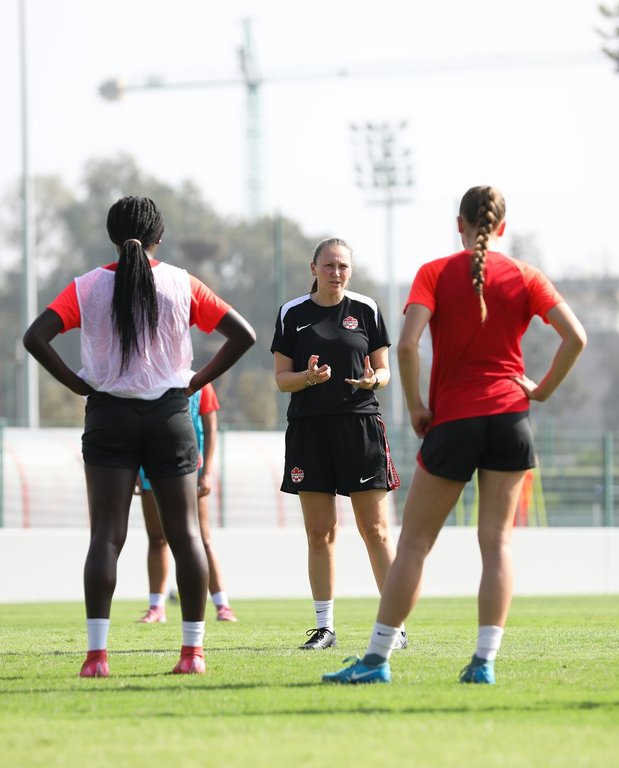RABAT, Morocco — Canada coach Jen Herst works with players during training in Rabat, Morocco, in a Thursday. Oct. 16, 2025, handout photo ahead of Canada's opening game Sunday against Nigeria at the FIFA U-17 Women's World Cup. THE CANADIAN PRESS/Handout - Canada Soccer, John Bruce, (Mandatory Credit)