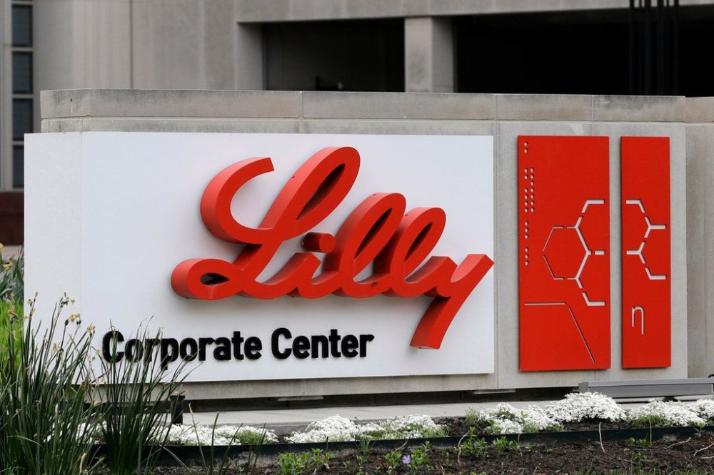FILE - A sign for Eli Lilly & Co. stands outside their corporate headquarters in Indianapolis on April 26, 2017. (AP Photo/Darron Cummings, File)