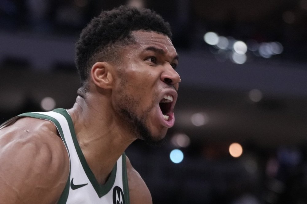 Milwaukee Bucks' Giannis Antetokounmpo reacts after a dunk during the second half of an NBA basketball game against the New York Knicks Tuesday, Oct. 28, 2025, in Milwaukee. (AP Photo/Morry Gash)