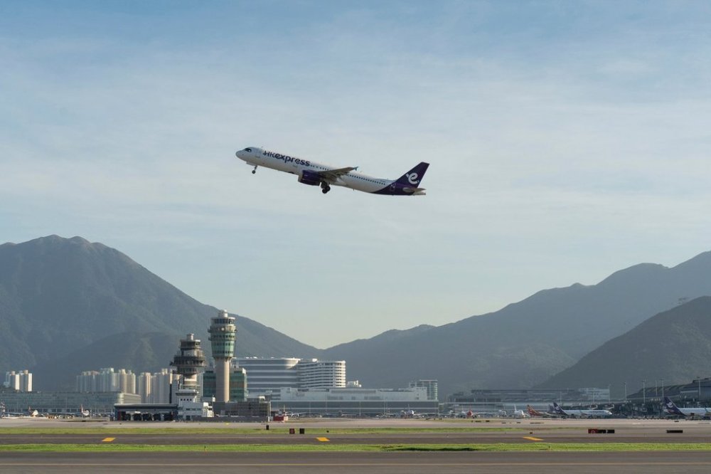 FILE - An aircraft takes off from the runway at the Hong Kong International Airport in Hong Kong, Nov. 27, 2024. (AP Photo/Chan Long Hei, File)