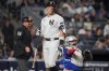 New York Yankees' Aaron Judge reacts after striking out against the Toronto Blue Jays during the eighth inning of Game 4 of baseball's American League Division Series, Wednesday, Oct. 8, 2025, in New York. (AP Photo/Frank Franklin II)