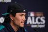 Seattle Mariners pitcher Bryan Woo speaks during a media availability the day before Game 3 of baseball's American League Championship Series against the Toronto Blue Jays, Tuesday, Oct. 14, 2025, in Seattle. (AP Photo/Lindsey Wasson)