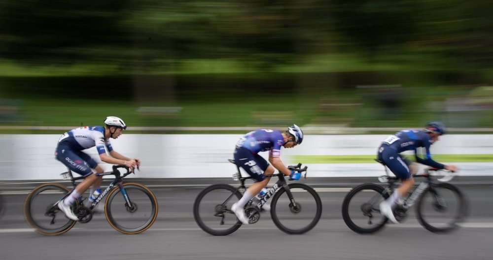 Quebecer Guillaume Boivin (centre) of the Israel-Premier Tech Pro Cycling Team competes in the Grand Prix Cycliste de Montreal on Sunday, Sept. 10, 2023 THE CANADIAN PRESS/Peter McCabe