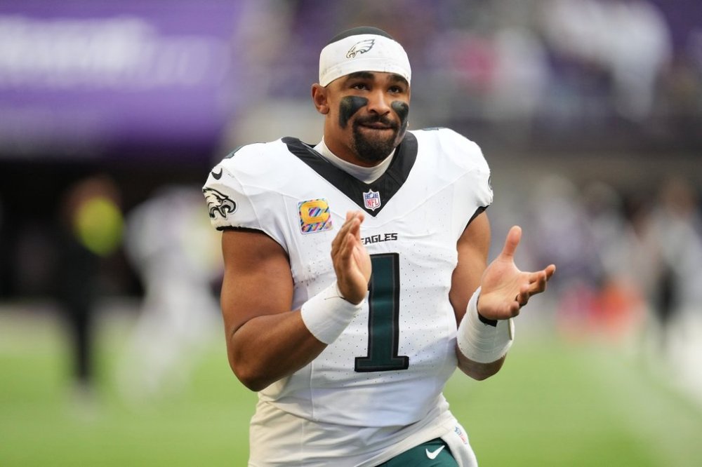 Philadelphia Eagles quarterback Jalen Hurts (1) walks off the field after a win over the Minnesota Vikings in an NFL football game Sunday, Oct. 19, 2025, in Minneapolis. (AP Photo/Abbie Parr)