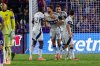Vancouver Whitecaps forward Thomas Müller (13) celebrate with teammates forward Nelson Pierre (42), defender Belal Halbouni, right center, and midfielder Sebastian Berhalter, right, after he scored the second goal against Orlando City during the second half of an MLS soccer match, Saturday, Oct. 11, 2025, in Orlando, Fla. (AP Photo/Kevin Kolczynski)