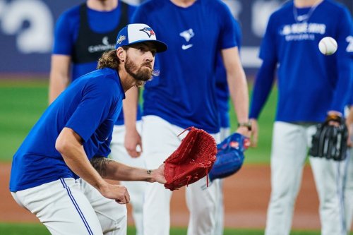 Toronto Blue Jays pitcher Kevin Gausman practices with his team ahead of Game 1 of the American League Championship Series against the Seattle Mariners in Toronto, on Saturday, Oct. 11, 2025. THE CANADIAN PRESS/Sammy Kogan