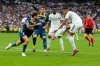 FILE - Real Madrid's Kylian Mbappe, right, and Espanyol's Fernando Calero, left, challenge for the ball during the Spanish La Liga soccer match between Real Madrid and Espanyol at the Santiago Bernabeu stadium in Madrid, Spain, Sept. 20, 2025. (AP Photo/Manu Fernandez, File)