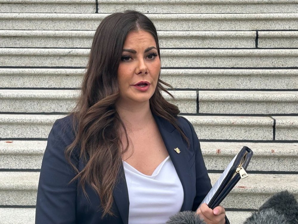 B.C. Conservative MLA Amelia Boultbee has announced she is quitting the party caucus and is calling on leader John Rustad to resign. Boultbee speaks outside the legislature in Victoria, on Monday, Oct. 20, 2025. THE CANADIAN PRESS/Wolfgang Depner