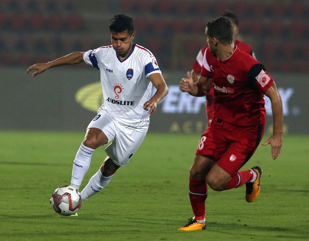 FILE - Mato Grgic of North East United FC, right, and Ulises Davila of Delhi Dynamos FC fight for a ball during the Hero Indian Super League soccer match in Gauhati, India, on Feb. 7, 2019, (AP Photo/Anupam Nath, File)