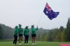 Winners of Australia team Stephanie Kyriacou, Grace Kim, Minjee Lee and Hannah Green wave their national flag after winning the LPGA International Crown golf tournament at the New Korea Country Club in Goyang, South Korea, Sunday, Oct. 26, 2025. (AP Photo/Ahn Young-joon)
