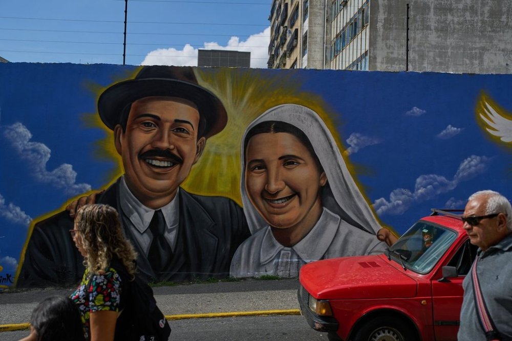 A mural features two late Venezuelans, Jose Gregorio Hernandez, the physician known as the