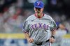 FILE - Texas Rangers pitching coach Mike Maddux (31) heads back to the dugout after a mound visit during the first inning of a baseball game against the Houston Astros, Friday, July 11, 2025, in Houston. (AP Photo/Kevin M. Cox, File)