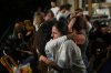 Relatives and supporters of Israeli hostages held by Hamas in the Gaza Strip celebrate after the announcement that Israel and Hamas have agreed to the first phase of a peace plan, as they gather at a plaza known as the hostages square in Tel Aviv, Israel, Thursday, Oct. 9, 2025. (AP Photo/Emilio Morenatti)