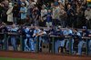 Toronto Blue Jays players watch from the dugout during the ninth inning in Game 5 of baseball's American League Championship Series against the Seattle Mariners, Friday, Oct. 17, 2025, in Seattle. (AP Photo/David J. Phillip)