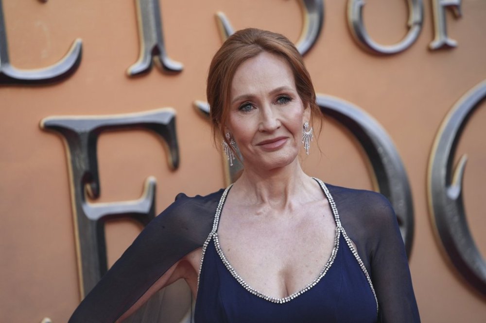 J. K. Rowling poses for photographers upon arrival at the World premiere of the film 'Fantastic Beasts: The Secrets of Dumbledore' in London Tuesday, March 29, 2022. (AP Photo/Scott Garfitt)