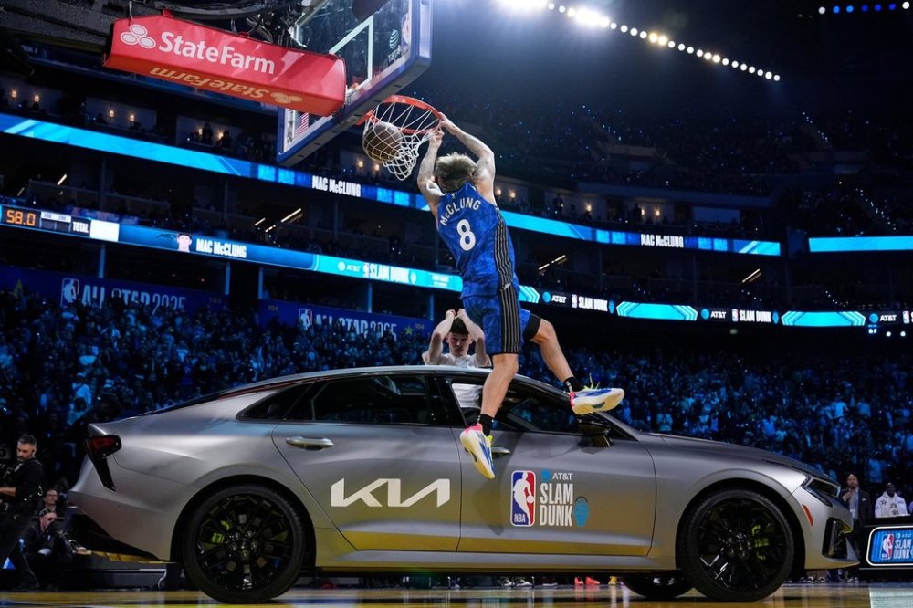 FILE - Osceola Magic guard Mac McClung dunks over a car during the slam dunk contest at the NBA basketball All-Star Saturday night festivities, Feb. 15, 2025, in San Francisco. (AP Photo/Godofredo A. Vásquez, file)