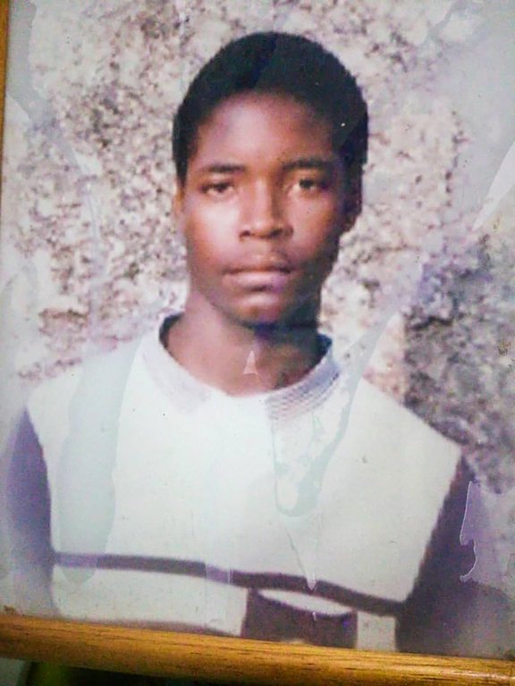 This undated photo shows Guide Nyachuru, who was one of over 100 boys abused in Zimbabwe by British barrister and lay preacher John Smyth 30 years ago. (Family Handout via AP)