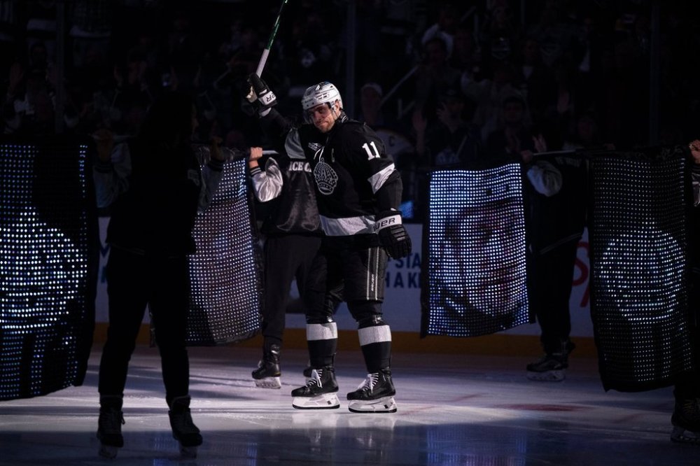 Los Angeles Kings center Anze Kopitar (11) is introduced before an NHL hockey game against Colorado Avalanche, Tuesday, Oct. 7, 2025, in Los Angeles. (AP Photo/Kyusung Gong)