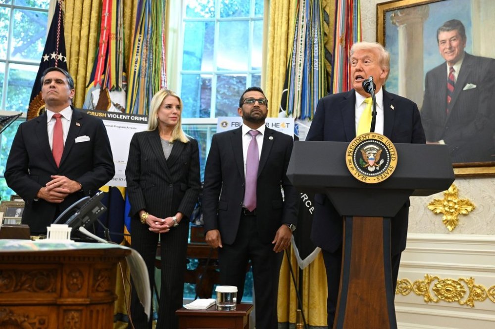 President Donald Trump speaks as FBI Director Kash Patel, Attorney General Pam Bondi, and Deputy Attorney General Todd Blanche listen during an event in the Oval Office at the White House, Wednesday, Oct. 15, 2025, in Washington. (AP Photo/John McDonnell)