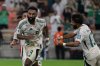 Saudi Arabia's Feras Albrikan, left, celebrates after scoring his side's opening goal during the World Cup 2026 Asian qualifier fourth-round Group B soccer match between Saudi Arabia and Indonesia at Alinma Bank Stadium in King Abdullah Sports City, in Jiddah, Saudi Arabia, Wednesday, Oct. 8, 2025. (AP Photo)