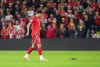 Wales' Brennan Johnson chases a rat off the pitch during the World Cup European Qualifying soccer match between Wales and Belgium at the Cardiff City Stadium in Cardiff, Monday, Oct. 13, 2025. (David Davies/PA via AP)