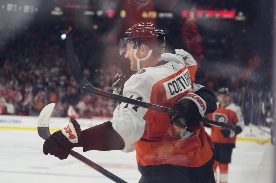 Philadelphia Flyers' Sean Couturier celebrates after scoring past Florida Panthers goaltender Daniil Tarasov on Monday. (Matt Rourke / The Associated Press files)