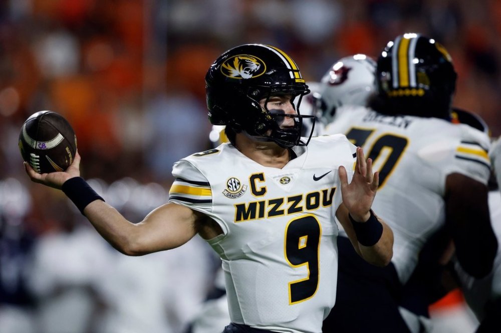 Missouri quarterback Beau Pribula (9) looks to throw a pass during the first half of an NCAA college football game against Auburn, Saturday, Oct. 18, 2025, in Auburn, Ala. (AP Photo/Butch Dill)