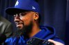 Los Angeles Dodgers right fielder Teoscar Hernández speaks during a World Series baseball media day, Thursday, Oct. 23, 2025, in Toronto. The Toronto Blue Jays face the Los Angeles Dodgers in Game 1 on Oct. 24. (AP Photo/Brynn Anderson)