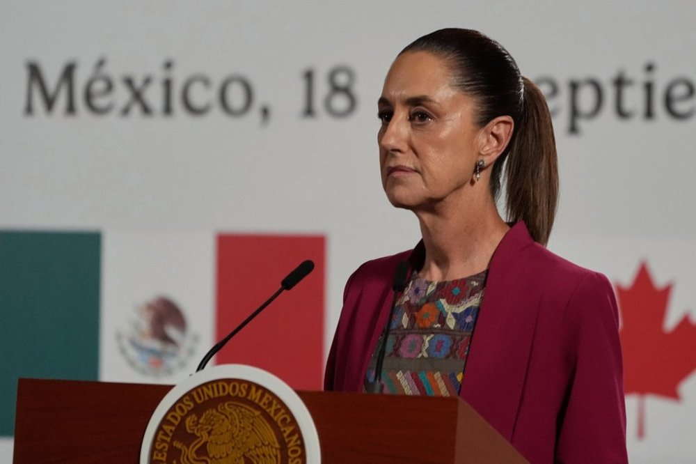 FILE - Mexico's President Claudia Sheinbaum speaks during a joint press conference with Canada's Prime Minister Mark Carney at the National Palace in Mexico City, Sept. 18, 2025. (AP Photo/Fernando Llano, File)