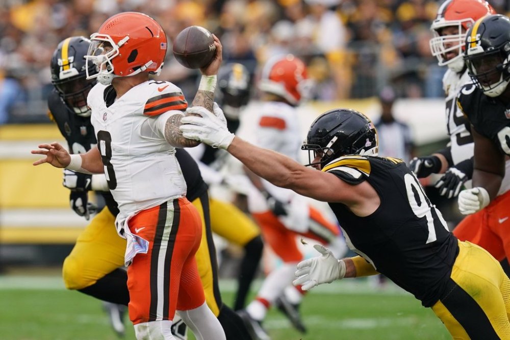 Pittsburgh Steelers outside linebacker T.J. Watt (90) pressures Cleveland Browns quarterback Dillon Gabriel (8) in the second half of an NFL football game in Pittsburgh, Sunday, Oct. 12, 2025. (AP Photo/Matt Freed)
