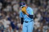 Toronto Blue Jays' pitcher Shane Bieber yells in his glove as he leaves the game during the sixth inning in Game 4 of baseball's World Series against the Los Angeles Dodgers, Tuesday, Oct. 28, 2025, in Los Angeles. (AP Photo/Ashley Landis)