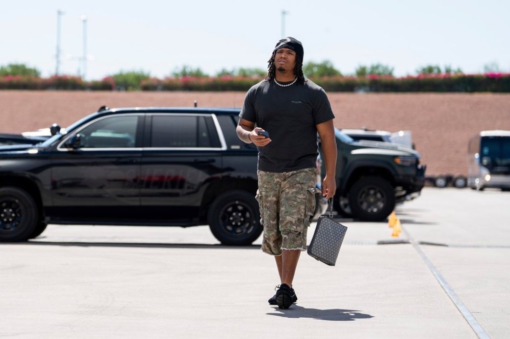 File - Arizona Cardinals defensive tackle Walter Nolen III arrives at State Farm Stadium in Glendale, Ariz. before a NFL football game against the Carolina Panthers, Sept. 14, 2025. (AP Photo/Samantha Chow, File)