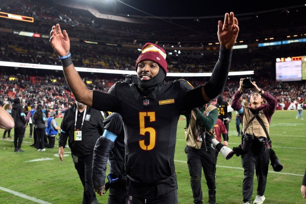 FILE - Washington Commanders quarterback Jayden Daniels (5) leaves the field after an 18-15 win over the Chicago Bears in an NFL football game, Oct. 27, 2024, in Landover, Md. (AP Photo/Nick Wass, File)