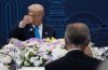 United States President Donald Trump looks to Prime Minister Mark Carney as they raise there glasses during a toast at a dinner with leaders in Gyeongju, South Korea, Wednesday, Oct 29, 2025. THE CANADIAN PRESS/Adrian Wyld