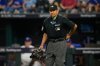 File - Umpire Alfonso Marquez looks on during the eighth inning of Game 3 of an American League Division Series baseball game in Arlington, Texas, Oct. 10, 2023. (AP Photo/Julio Cortez, File)