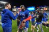 Toronto Blue Jays first baseman Vladimir Guerrero Jr. celebrates with teammates after beating the New York Yankees in Game 4 of baseball's American League Division Series, Wednesday, Oct. 8, 2025, in New York. (AP Photo/Frank Franklin II)