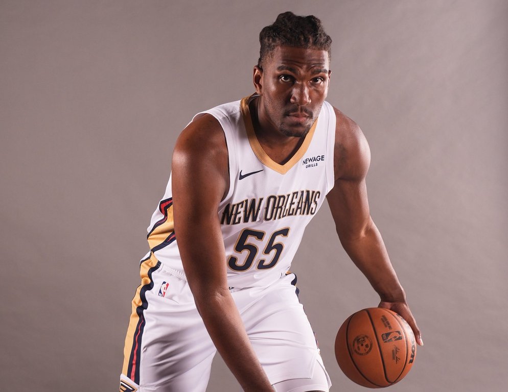 FILE - New Orleans Pelicans forward Kevon Looney (55) poses for a portrait during their NBA basketball media day in Metairie, La., Sept. 23, 2025. (AP Photo/Gerald Herbert, File)