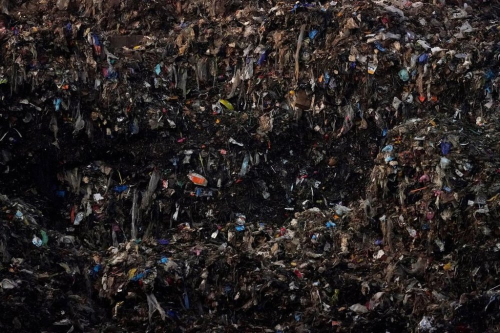 FILE - Shredded organic materials are piled up at a GreenWaste Renewable Energy Digestion Facility in San Jose, Calif., Oct. 27, 2023. (AP Photo/Jeff Chiu, File)