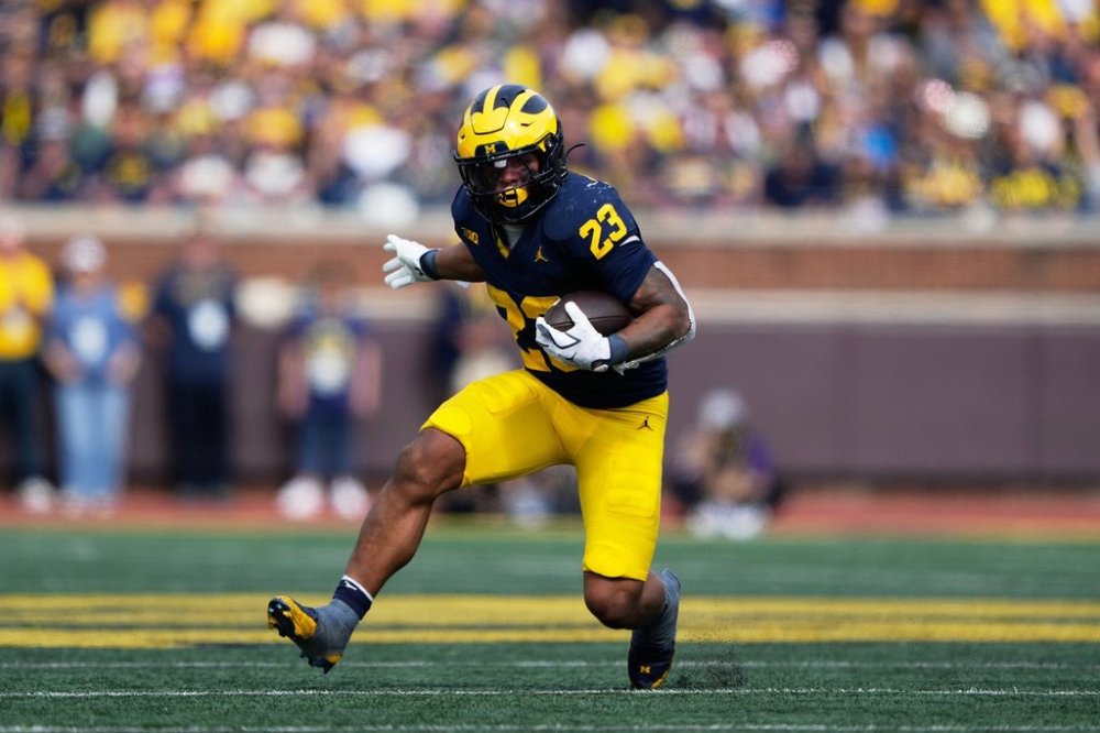 Michigan running back Jordan Marshall runs during the first half of an NCAA college football game against Washington, Saturday, Oct. 18, 2025, in Ann Arbor, Mich. (AP Photo/Ryan Sun)