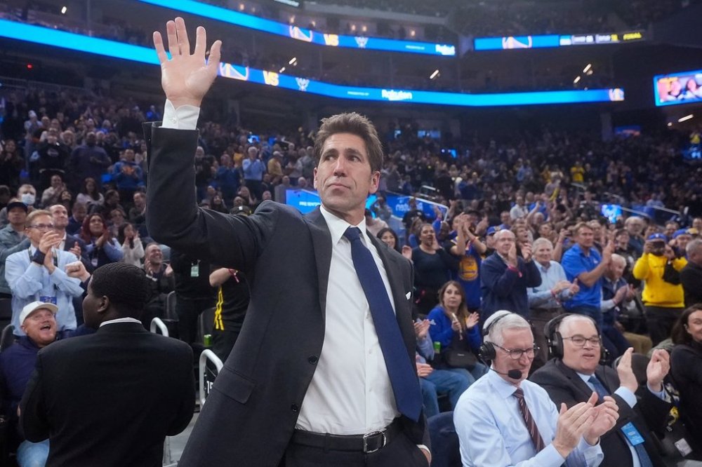FILE - Former Golden State Warriors general manager Bob Myers waves while being honored during the first half of an NBA basketball game between the Warriors and the Milwaukee Bucks in San Francisco, Wednesday, March 6, 2024. (AP Photo/Jeff Chiu, File)