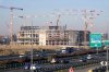 FILE - Construction continues at the Milano Santagiulia Ice Hockey Arena for the Milan Cortina 2026 Winter Olympics in Assago, near Milan, Italy, Wednesday, Jan. 15, 2025. (AP Photo/Luca Bruno, File)