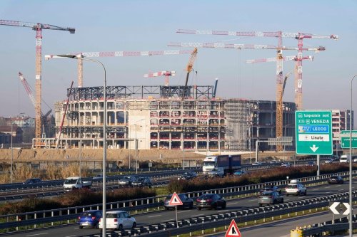 FILE - Construction continues at the Milano Santagiulia Ice Hockey Arena for the Milan Cortina 2026 Winter Olympics in Assago, near Milan, Italy, Wednesday, Jan. 15, 2025. (AP Photo/Luca Bruno, File)
