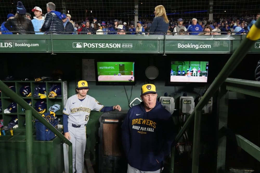 Milwaukee Brewers manager Pat Murphy stands in the dugout before Game 4 of baseball's National League Division Series against the Chicago Cubs Thursday, Oct. 9, 2025, in Chicago. (AP Photo/Nam Y. Huh)