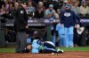 Toronto Blue Jays designated hitter George Springer falls after being hit by a pitch in the seventh inning of Game 5 against the Mariners in baseball's American League Championship Series on Oct. 17, 2025, in Seattle. (AP Photo/Lindsey Wasson)